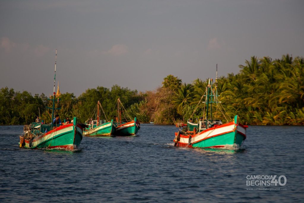 See the local fishing boats on a Kampot Boat Trip